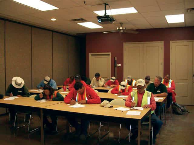 AAA Landscape team members in a training session
